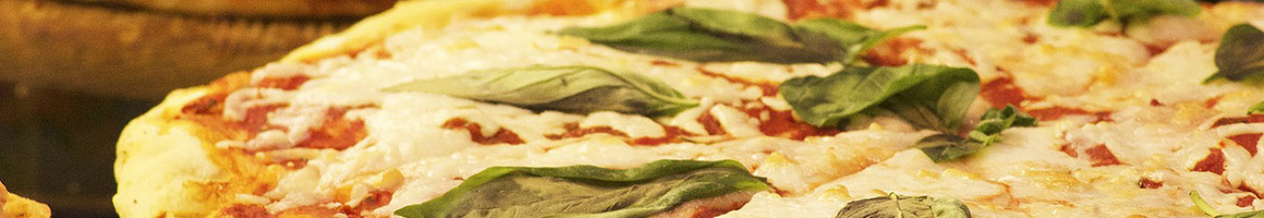 Eating Italian Pizza at Bona Italian Restaurant restaurant in Wilton Manors, FL.